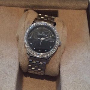 Lucien Piccard silver and black face watch